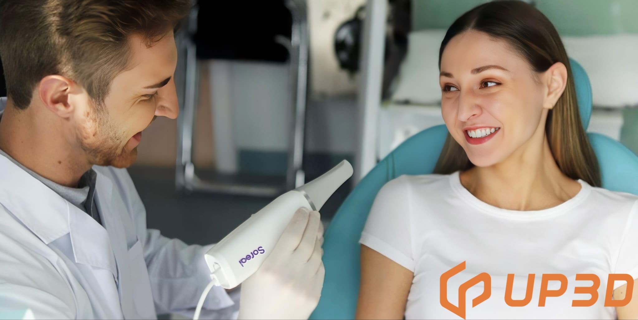 Dentist using UP3D intraoral scanner for chairside digital impression with patient smiling