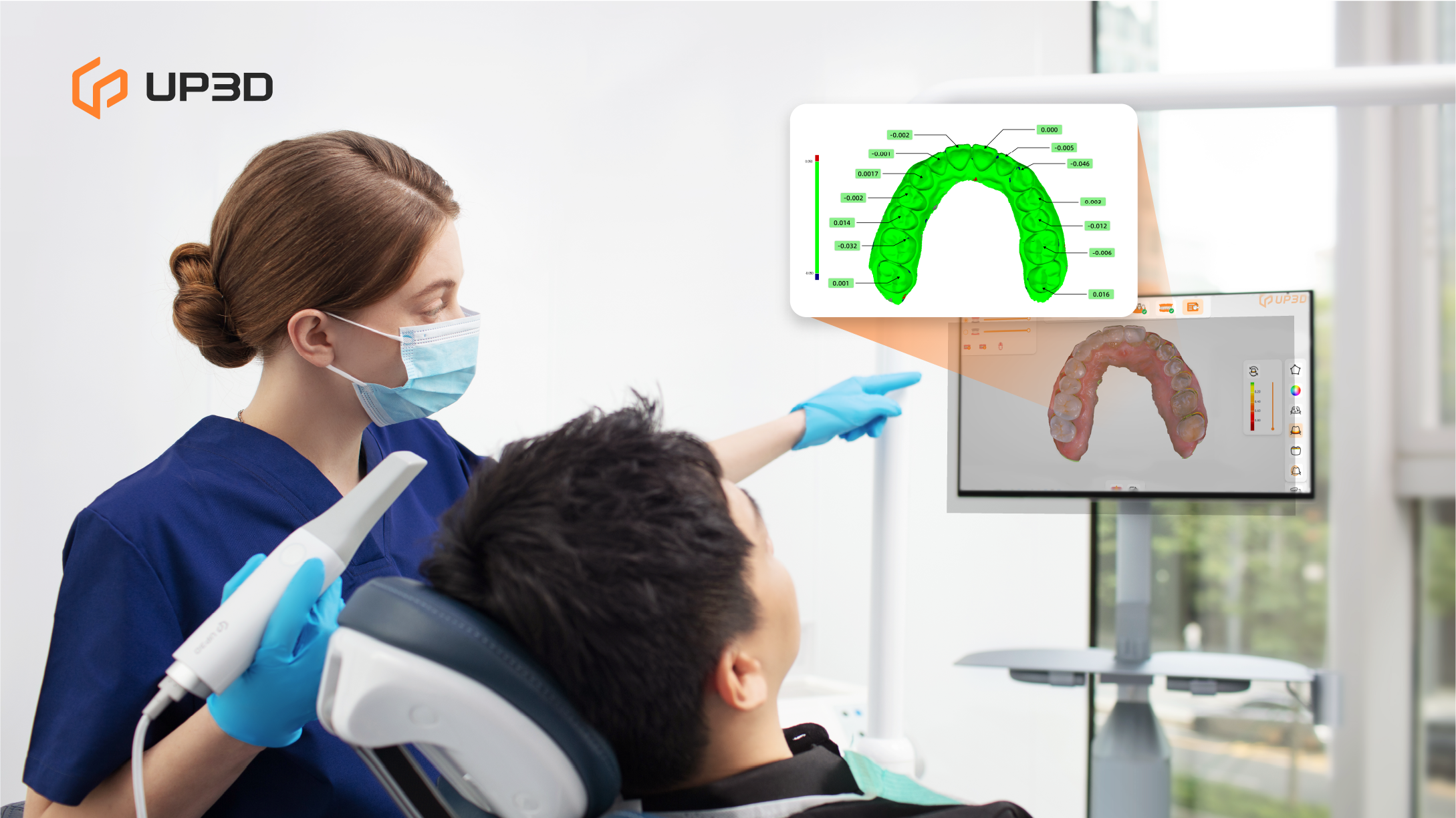 Dentist demonstrating UP3D UP610 intraoral scanner results on screen, showing a 3D digital model and accuracy analysis during dental scanning.