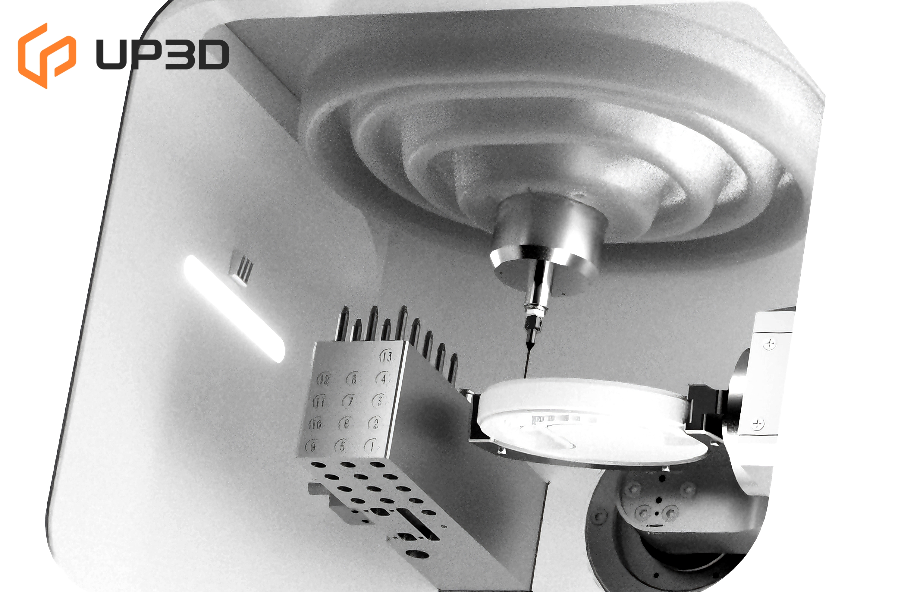 Interior of UP3D P55D dental milling machine with disc and milling tools