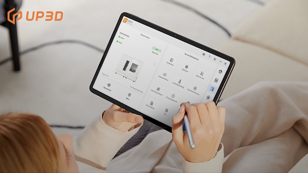 User managing UP3D dental milling machine with smart tablet control and system reminders