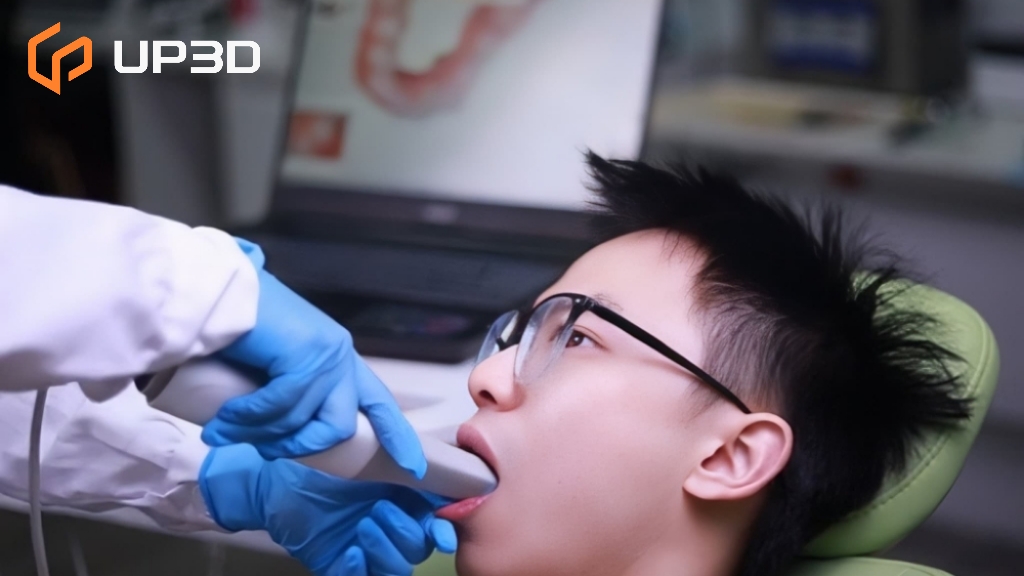 Dentist using UP610 intraoral scanner to capture precise digital impressions for dental restorations